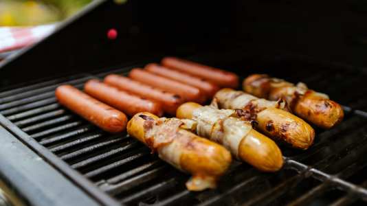 Hotdogs on a grill